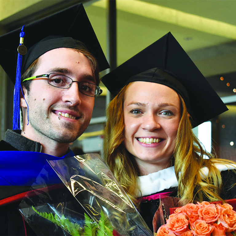 Image of Jamie Root and Rodica Frimu at commencement ceremonies in 2017.