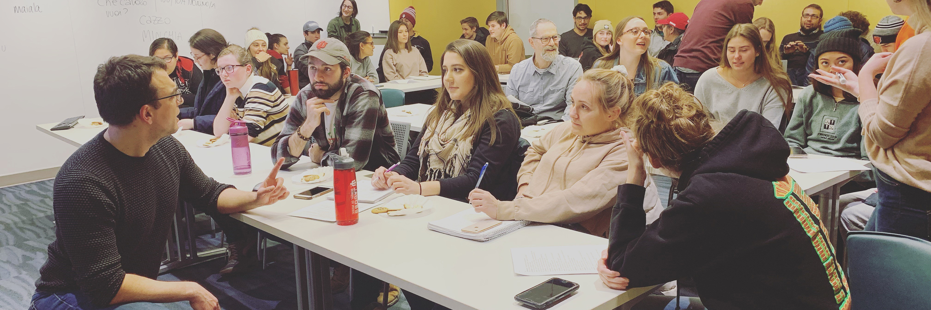 The Italian Club gathers for an event in the Global and International Studies Building on the Indiana University Bloomington campus. 