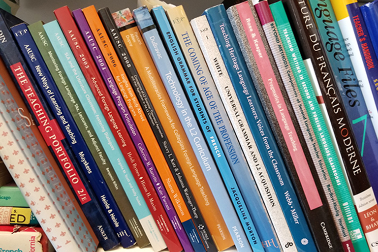 Language books on a bookshelf. 