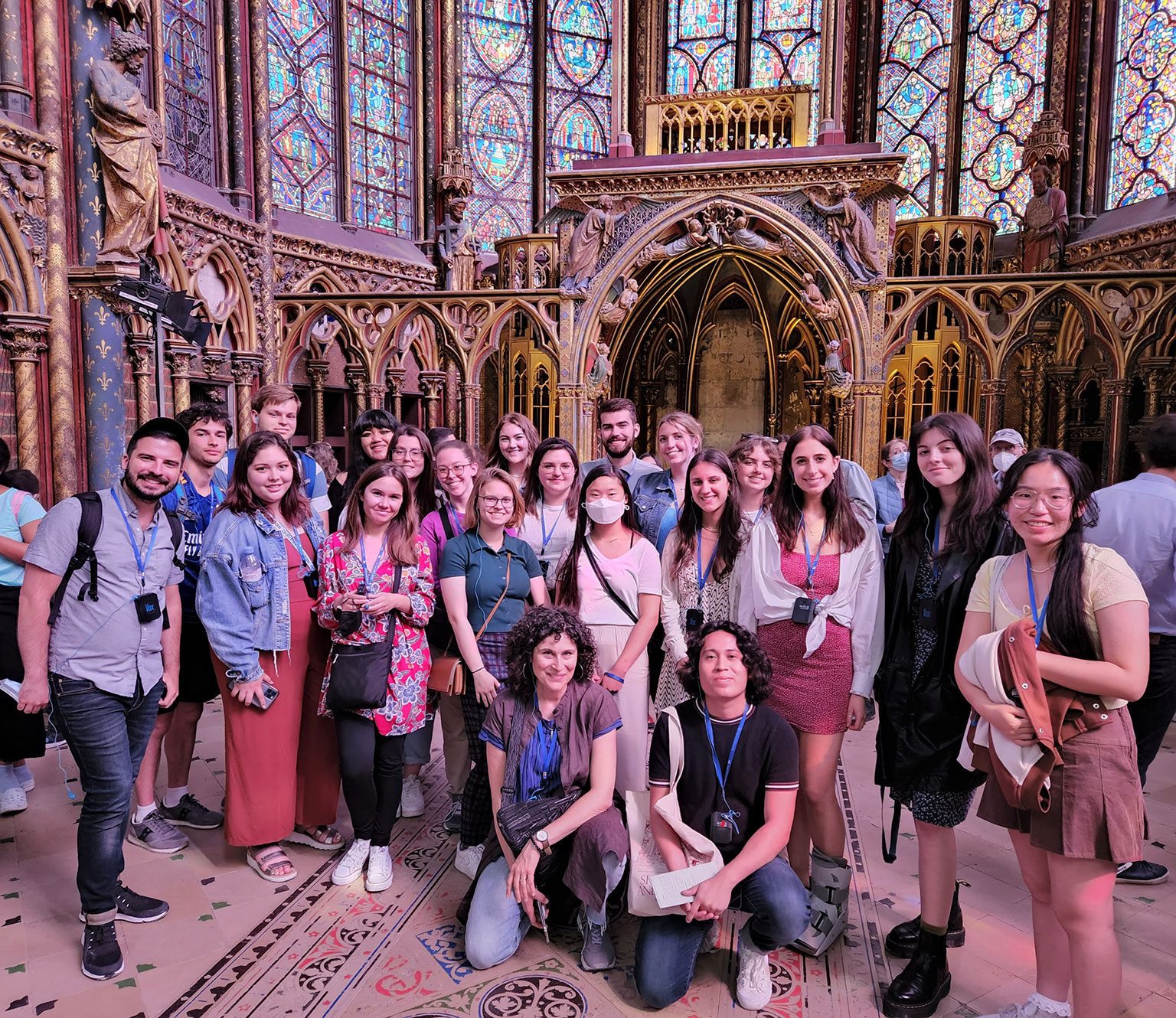 Professor Alison Calhoun poses with a group of Hutton Honors College students in Sainte-Chapelle in Paris.