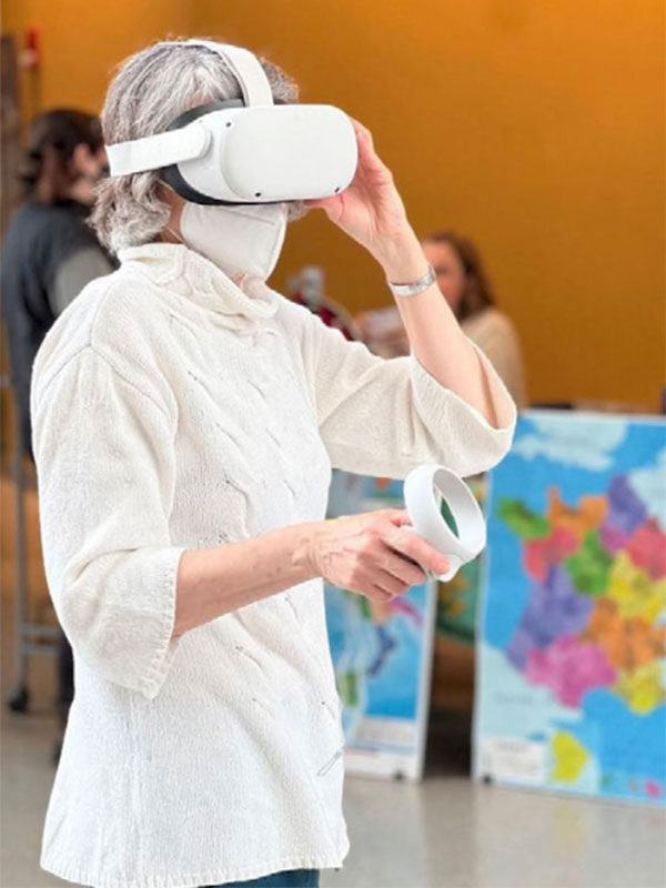 A person wearing a white VR headset.